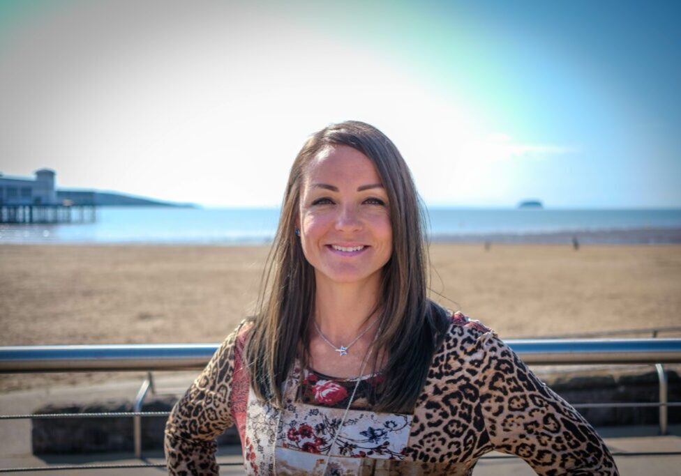 Jeni Crane Nutritional Therapist Phlebotomist headshot on Weston Super Mare Seafront Jeni Crane Nutritional Therapist/Nutritionist and phlebotomist at the sea front in Weston Super Mare